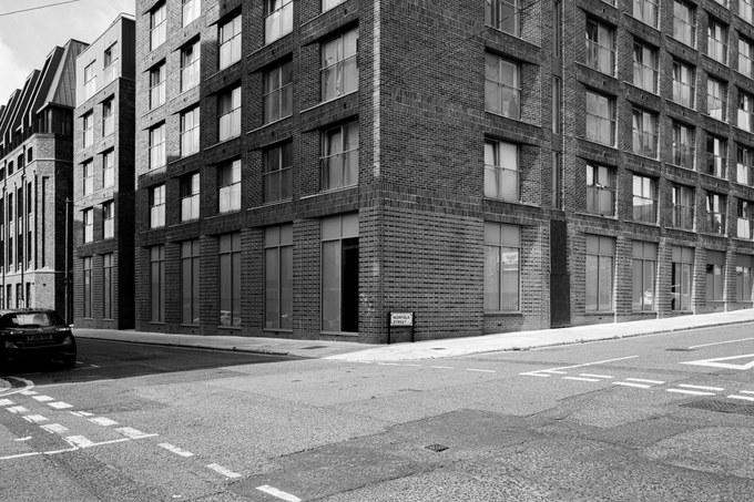 The view from the step. Norfolk Street and a building that wasn't there yet.