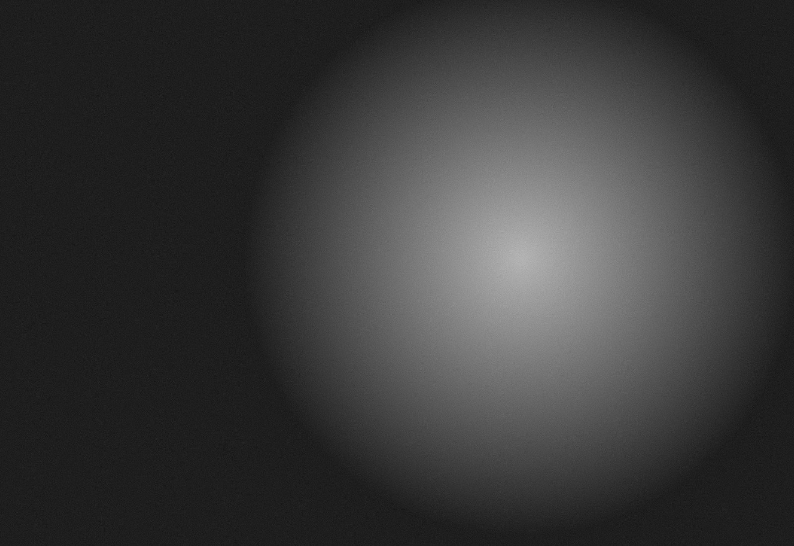 Low sun through cloud, near silhouette